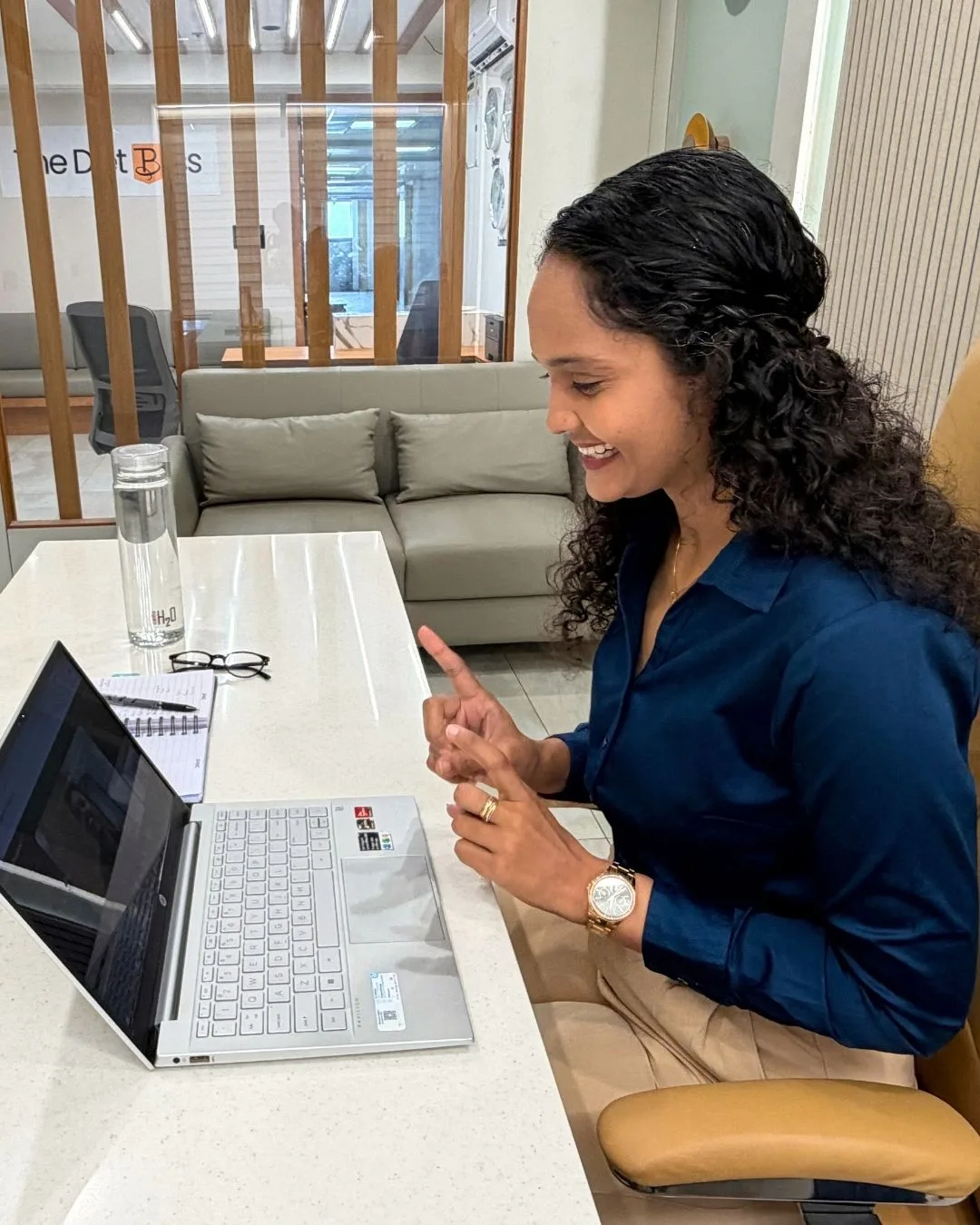 Riddhi talking to a client on a video call